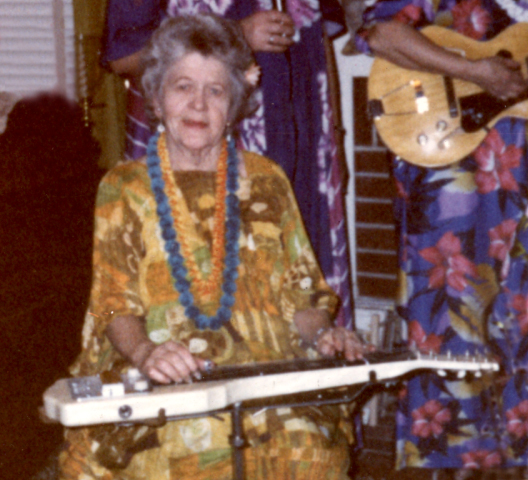 Clara May playing the Hawaiian guitar in 1986.